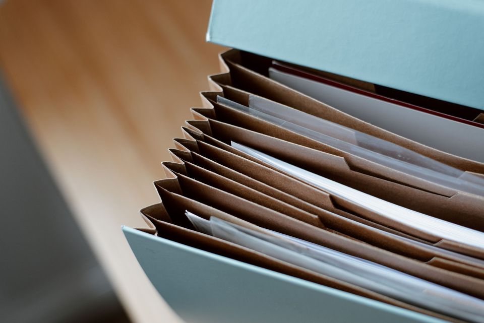 Documents neatly filed in an open folder