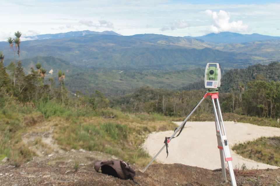 Survey instrument set up on Timin Pass, Magarima, in the Papua New Guinea Highlands